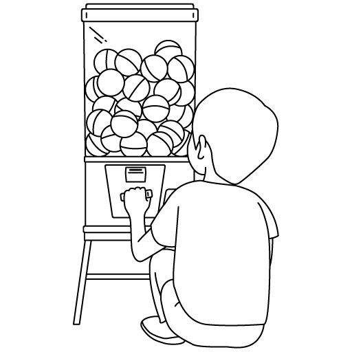 カプセルトイを回す男の子